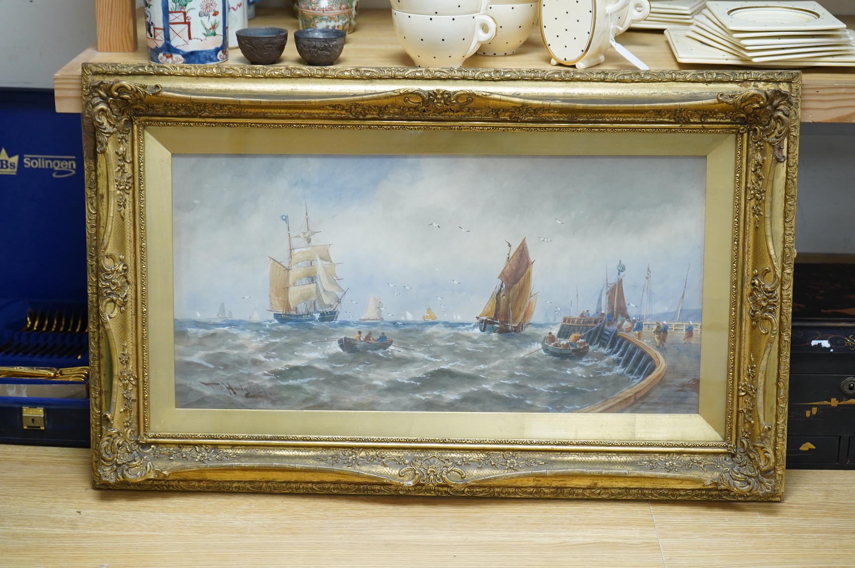 Thomas Bush Hardy (1842-1897), Maritime scene with ships and rowing boats, signed and dated 1887, watercolour heightened with white, 28 x 60cm, ornate gilt frame